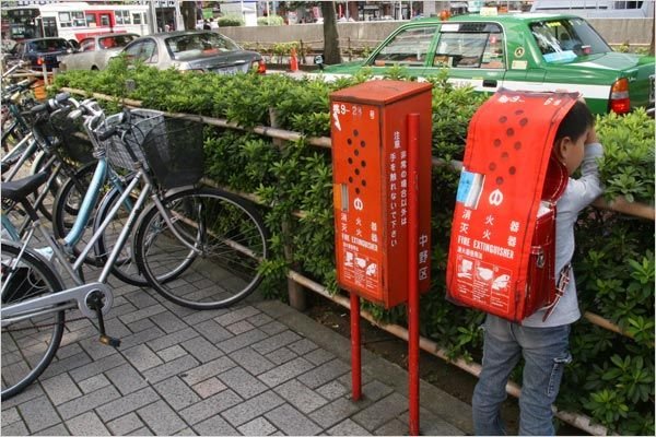 Japanese-Fire-Extinguisher-Disguises-4